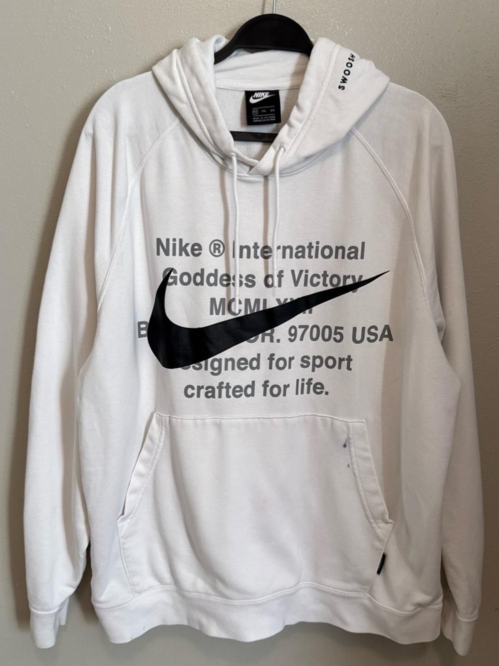 Nike White Hoodie with Black Swoosh and Text Graphic